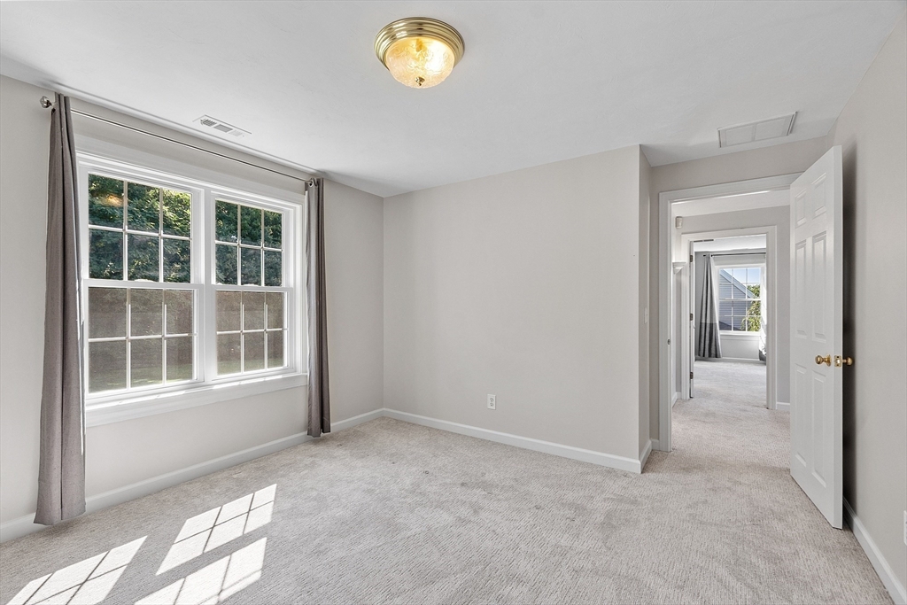 18 Sycamore Road Shrewsbury, MA 01545 - Photo 24 of 40 a view of an empty room with a window