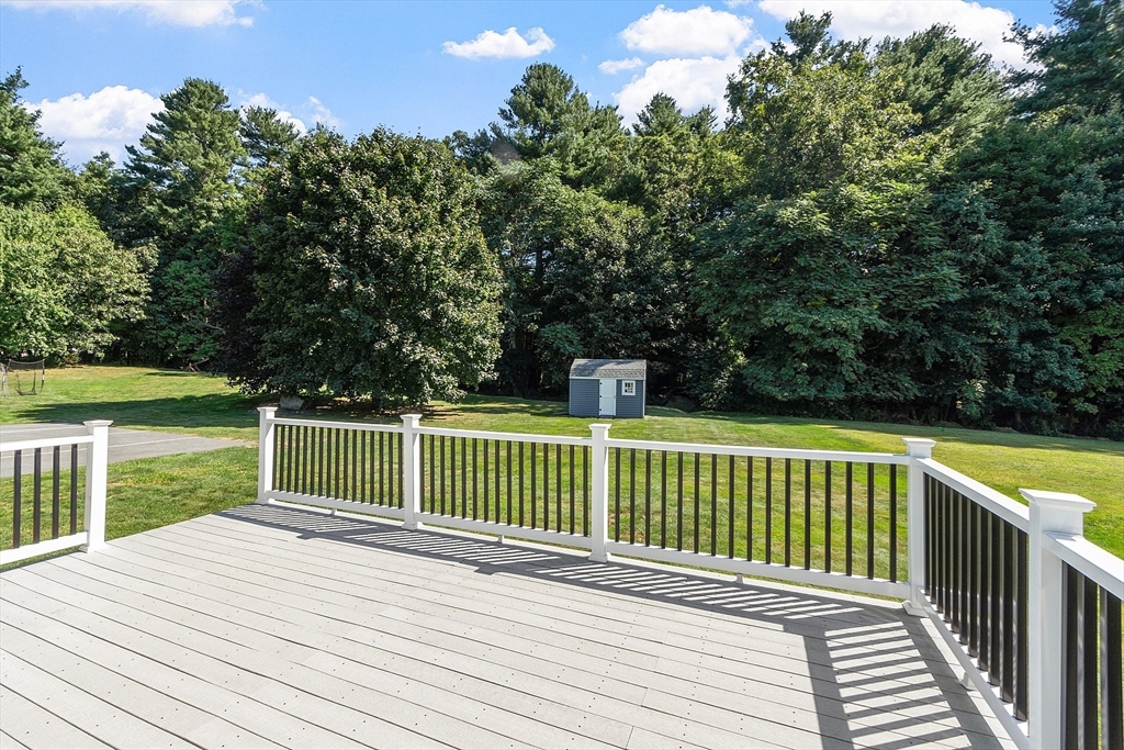 18 Sycamore Road Shrewsbury, MA 01545 - Photo 32 of 40 a view of balcony with wooden floor and fence