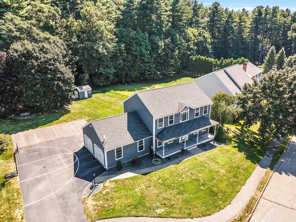 18 Sycamore Road Shrewsbury, MA 01545 - Photo 36 of 40 a view of a swimming pool with a patio