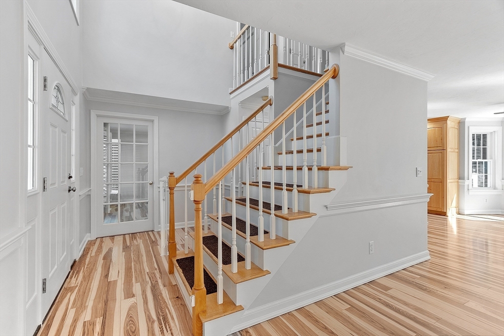 18 Sycamore Road Shrewsbury, MA 01545 - Photo 9 of 40 a view of entryway with wooden floor and stairs