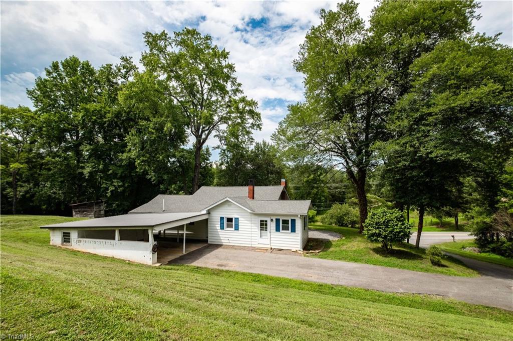 337 East Carter Mill Road Elkin, NC 28621 - Photo 3 of 17 Rear view of home showing carport