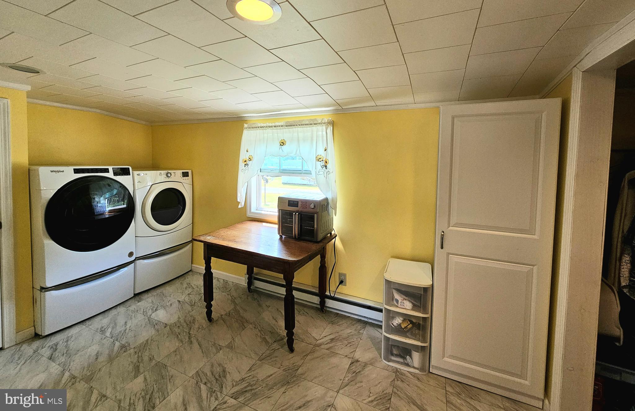 7558 Catlin Road Westover, MD 21871 - Photo 16 of 40 a utility room with dryer and washer