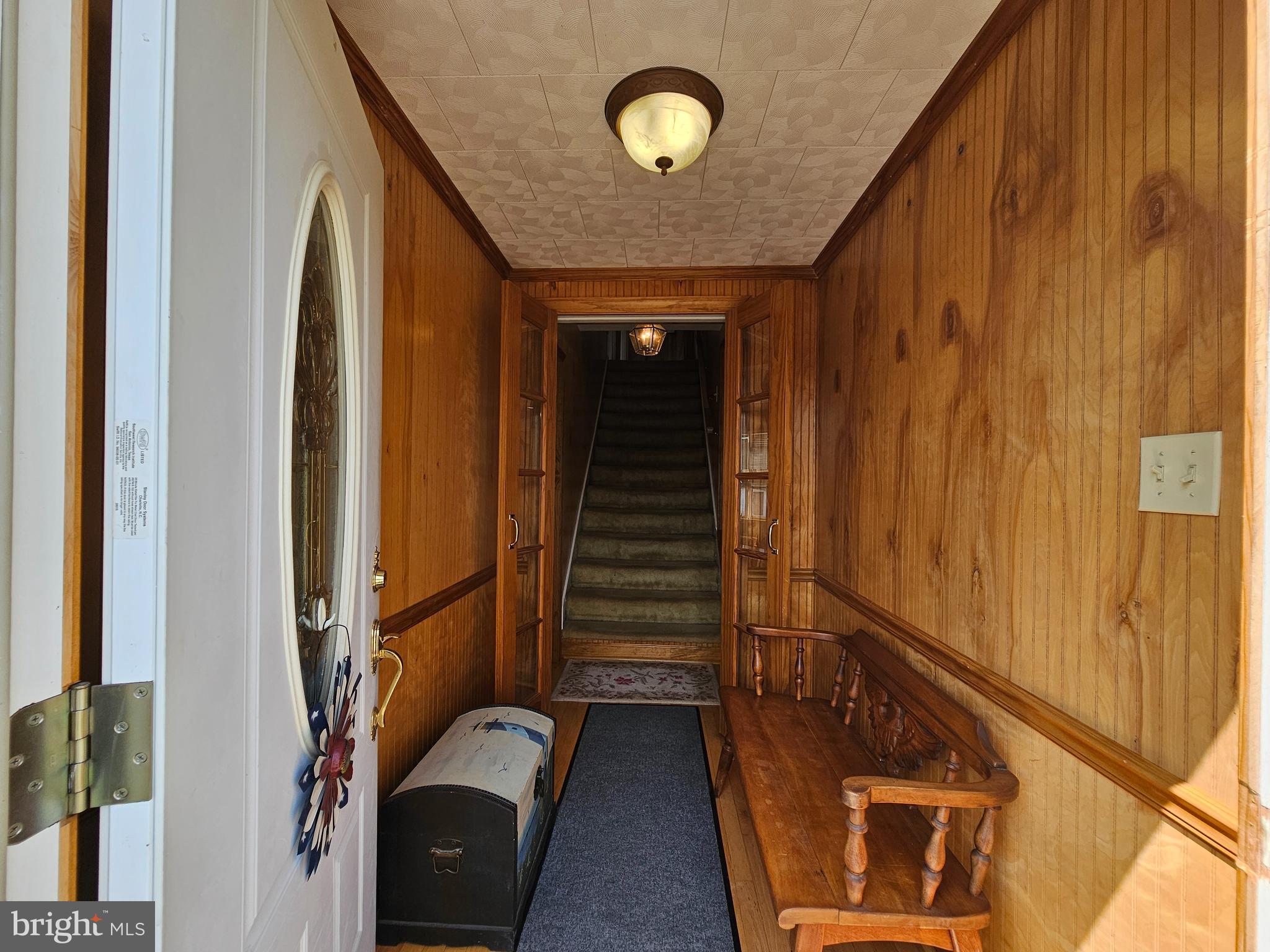 7558 Catlin Road Westover, MD 21871 - Photo 2 of 40 a view of front door with stairs