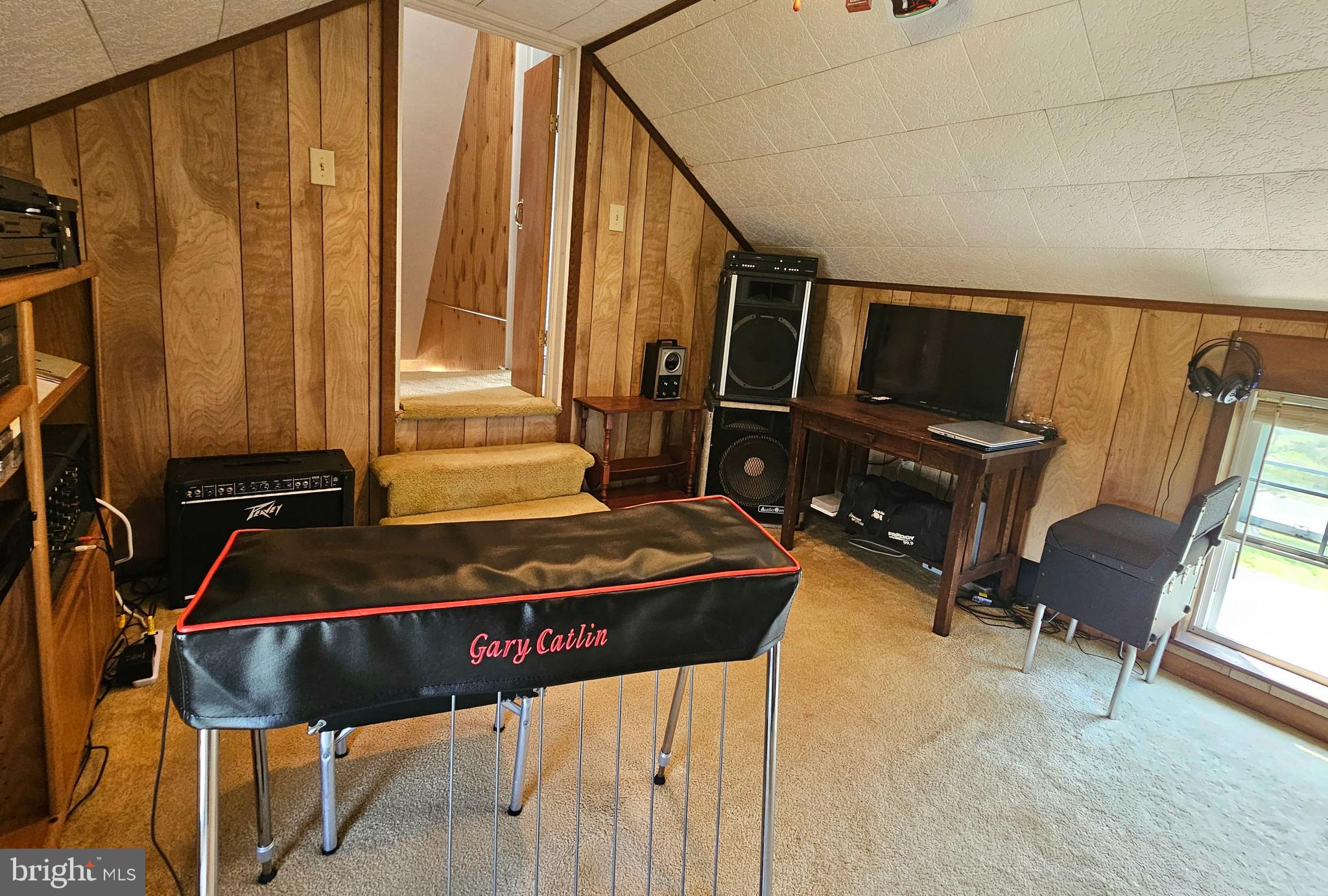 7558 Catlin Road Westover, MD 21871 - Photo 25 of 40 a living room with furniture and a flat screen tv