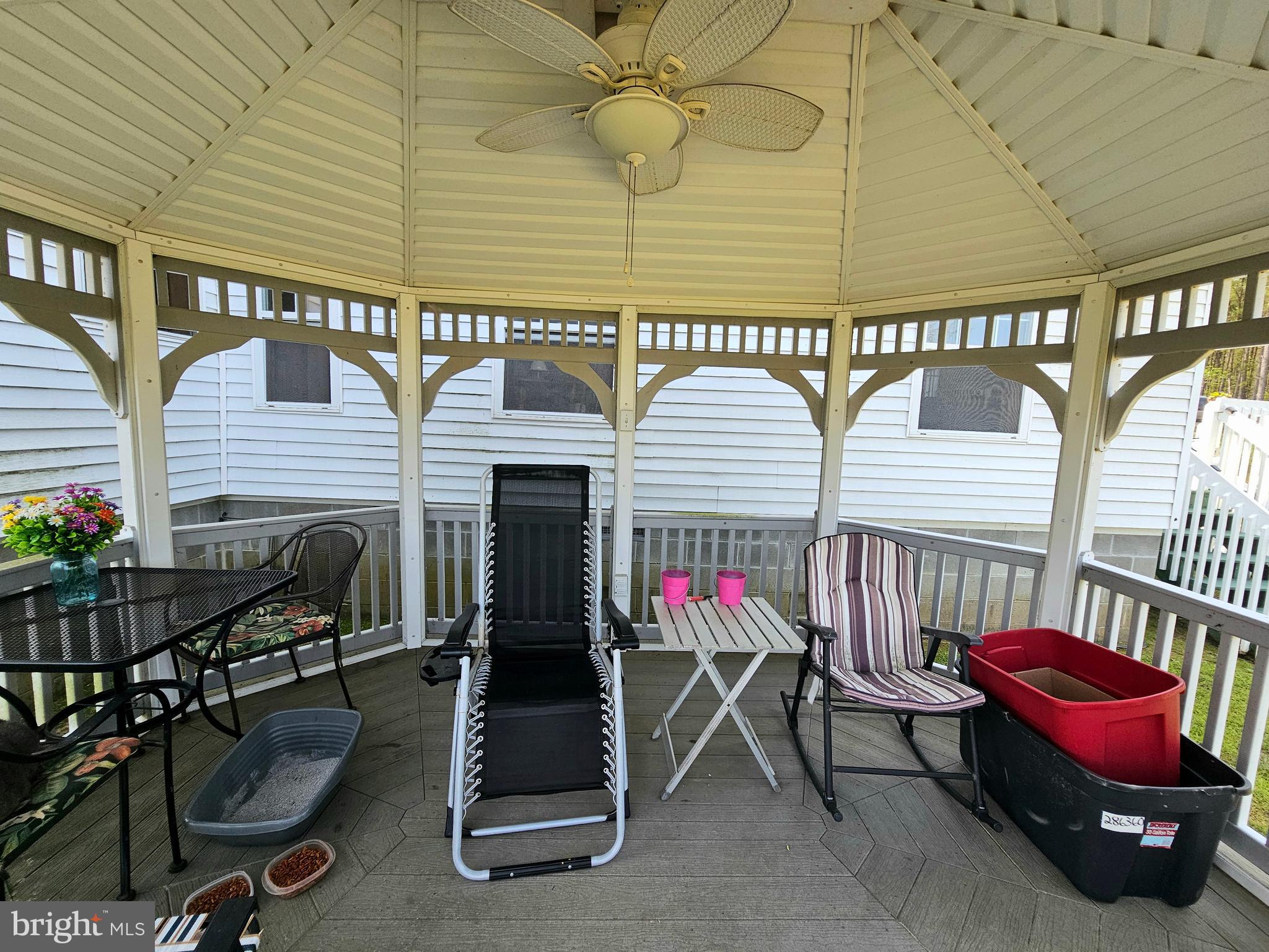 7558 Catlin Road Westover, MD 21871 - Photo 31 of 40 a view of a patio with a table and chairs