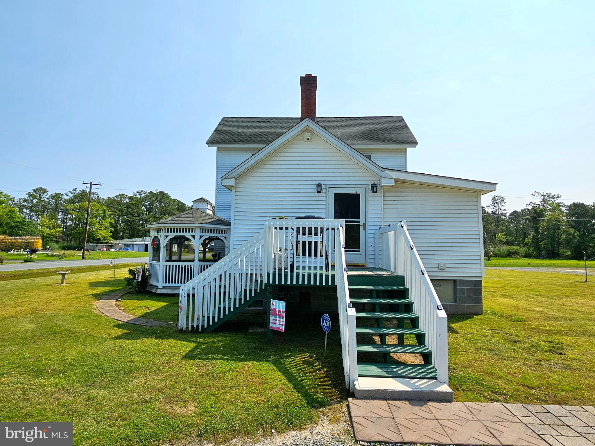 7558 Catlin Road Westover, MD 21871 - Photo 32 of 40 a front view of a house with garden