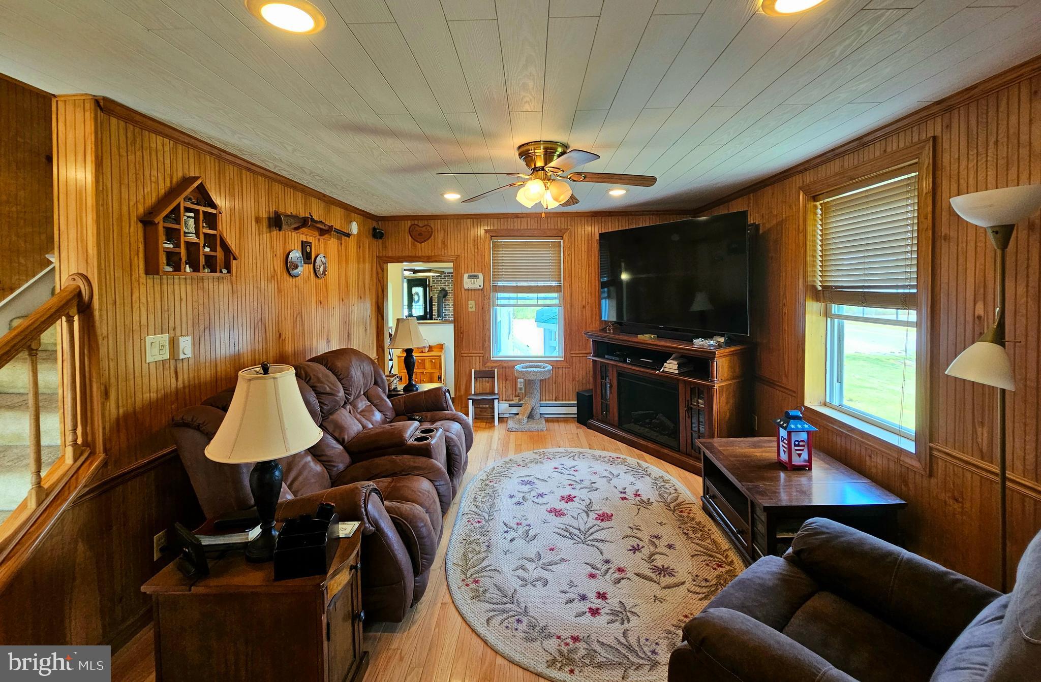 7558 Catlin Road Westover, MD 21871 - Photo 5 of 40 a living room with furniture and a flat screen tv