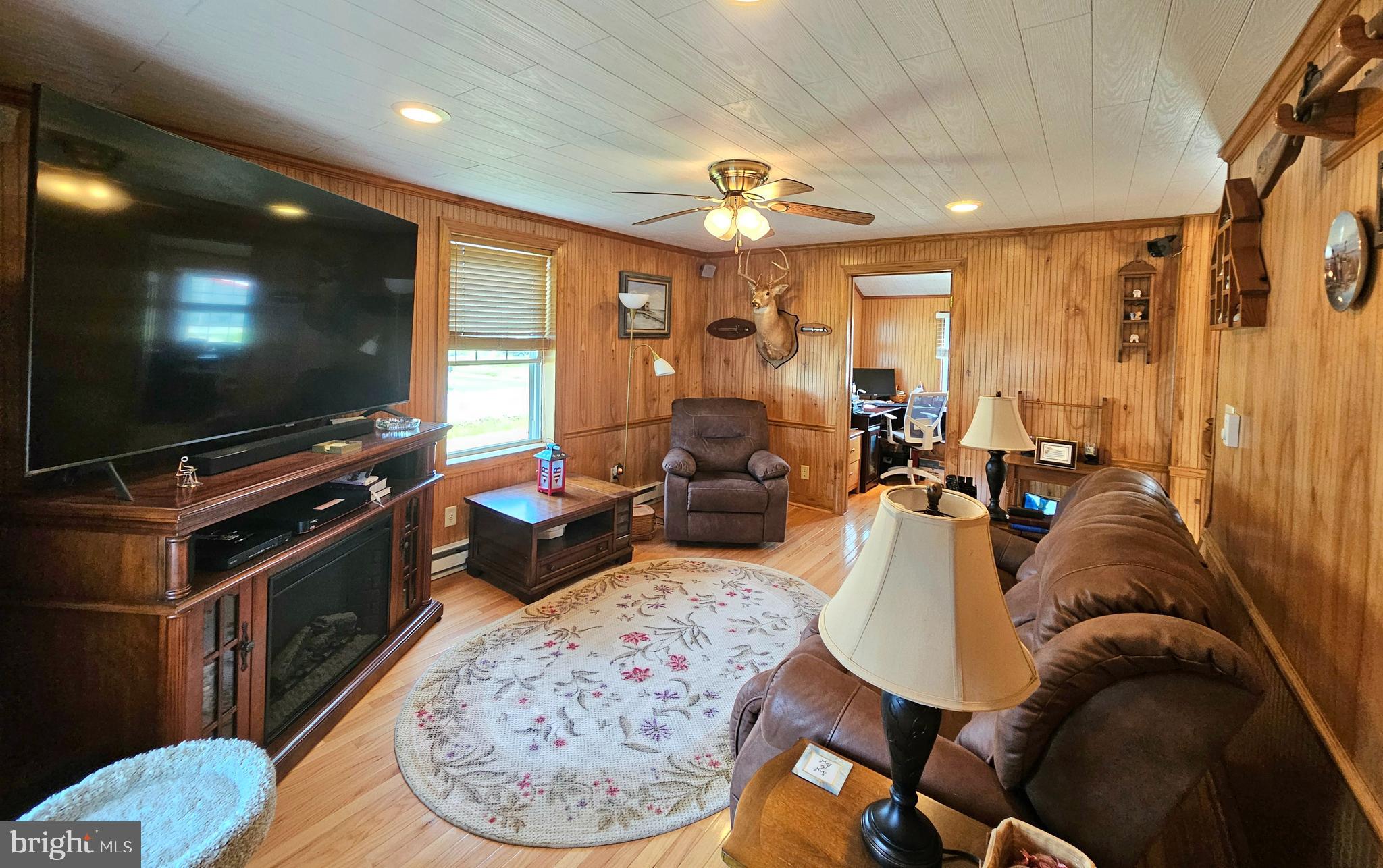 7558 Catlin Road Westover, MD 21871 - Photo 6 of 40 a living room with furniture and a flat screen tv