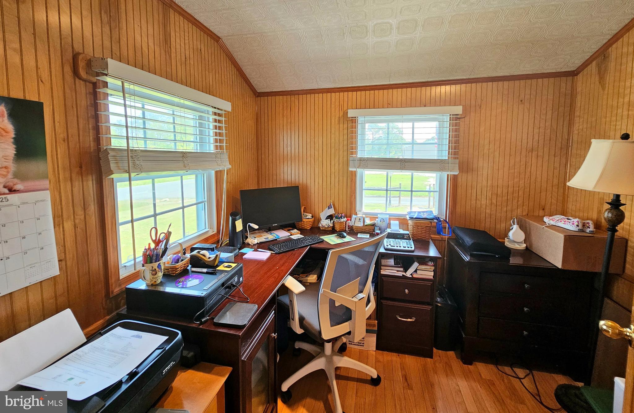 7558 Catlin Road Westover, MD 21871 - Photo 7 of 40 a view of a workspace with furniture and a window