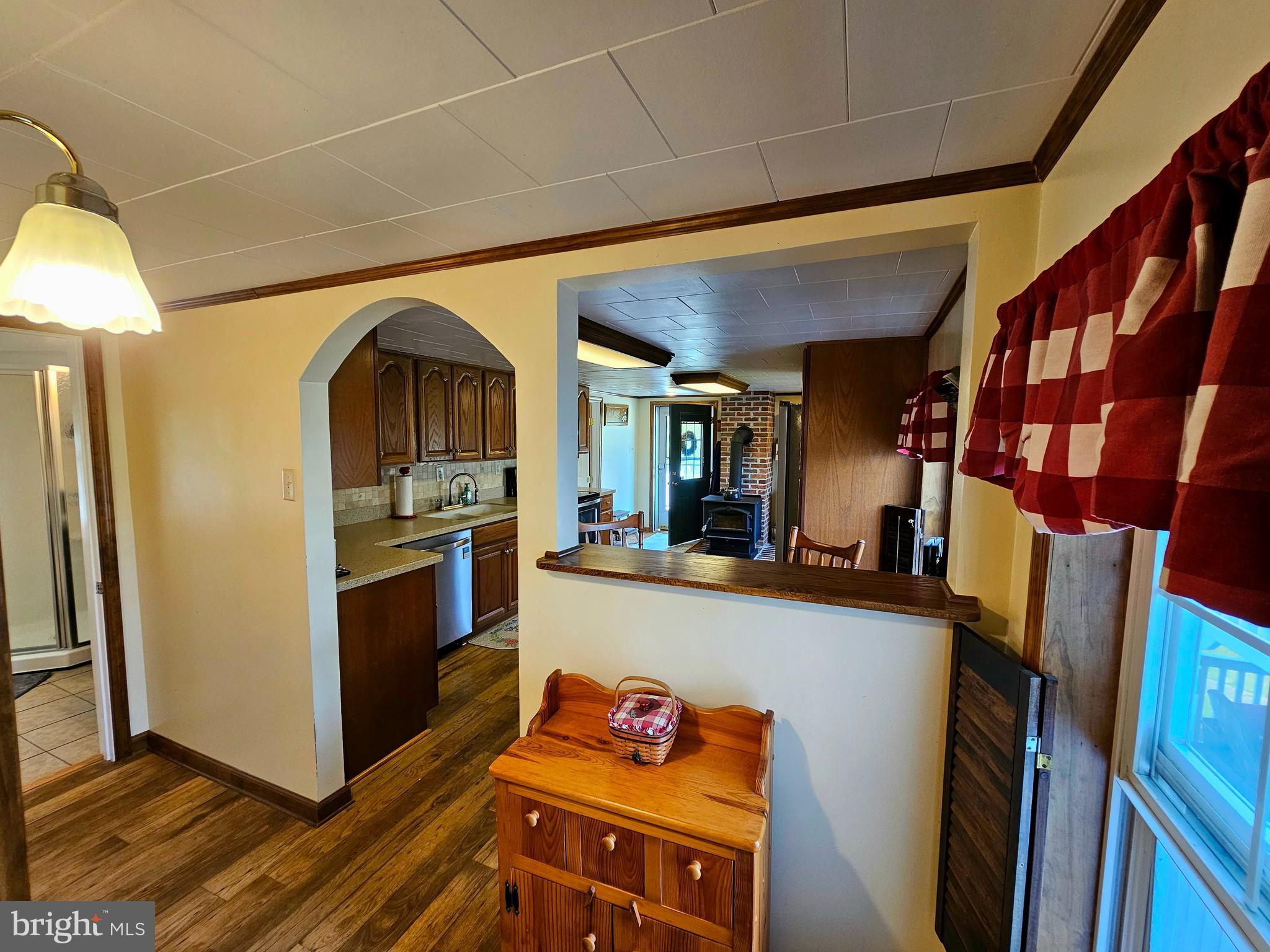 7558 Catlin Road Westover, MD 21871 - Photo 9 of 40 a kitchen with stainless steel appliances granite countertop a refrigerator and a stove