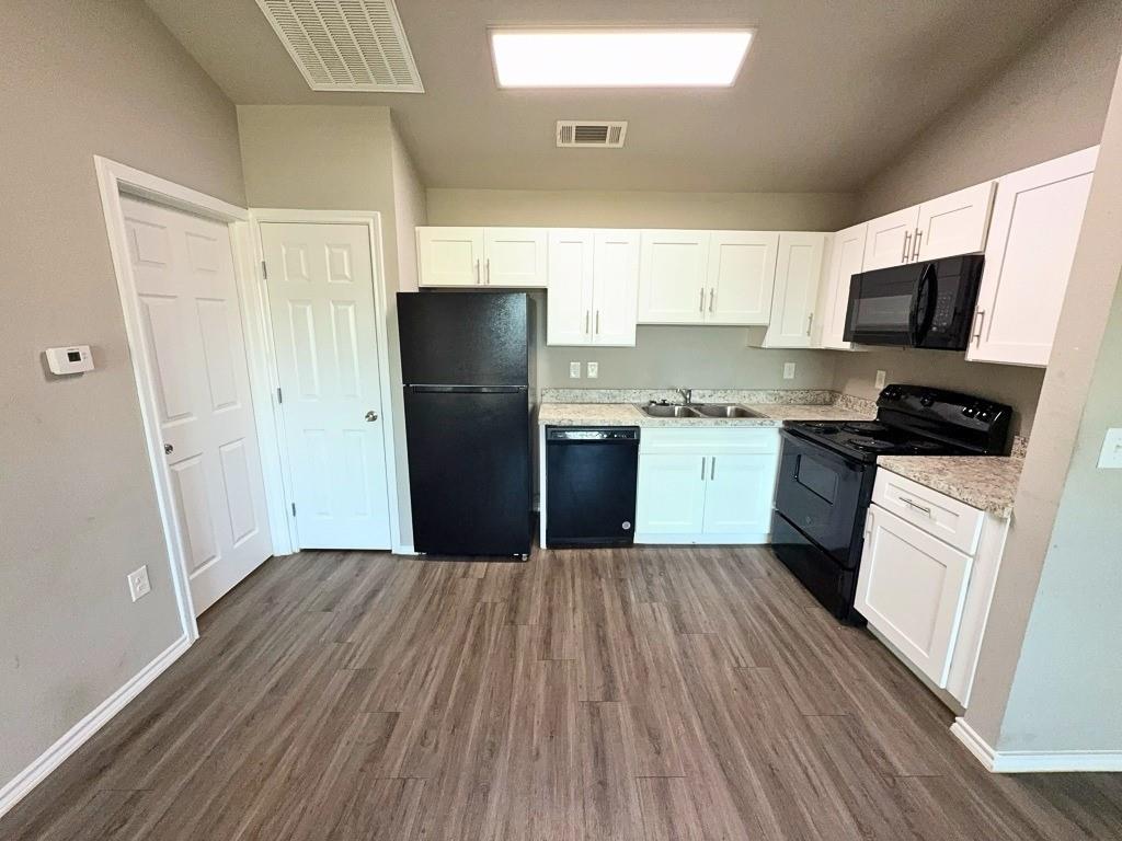 6108 Abrams Road, Unit 222 Dallas, TX 75231 - Photo 4 of 13 Kitchen with full-size appliances