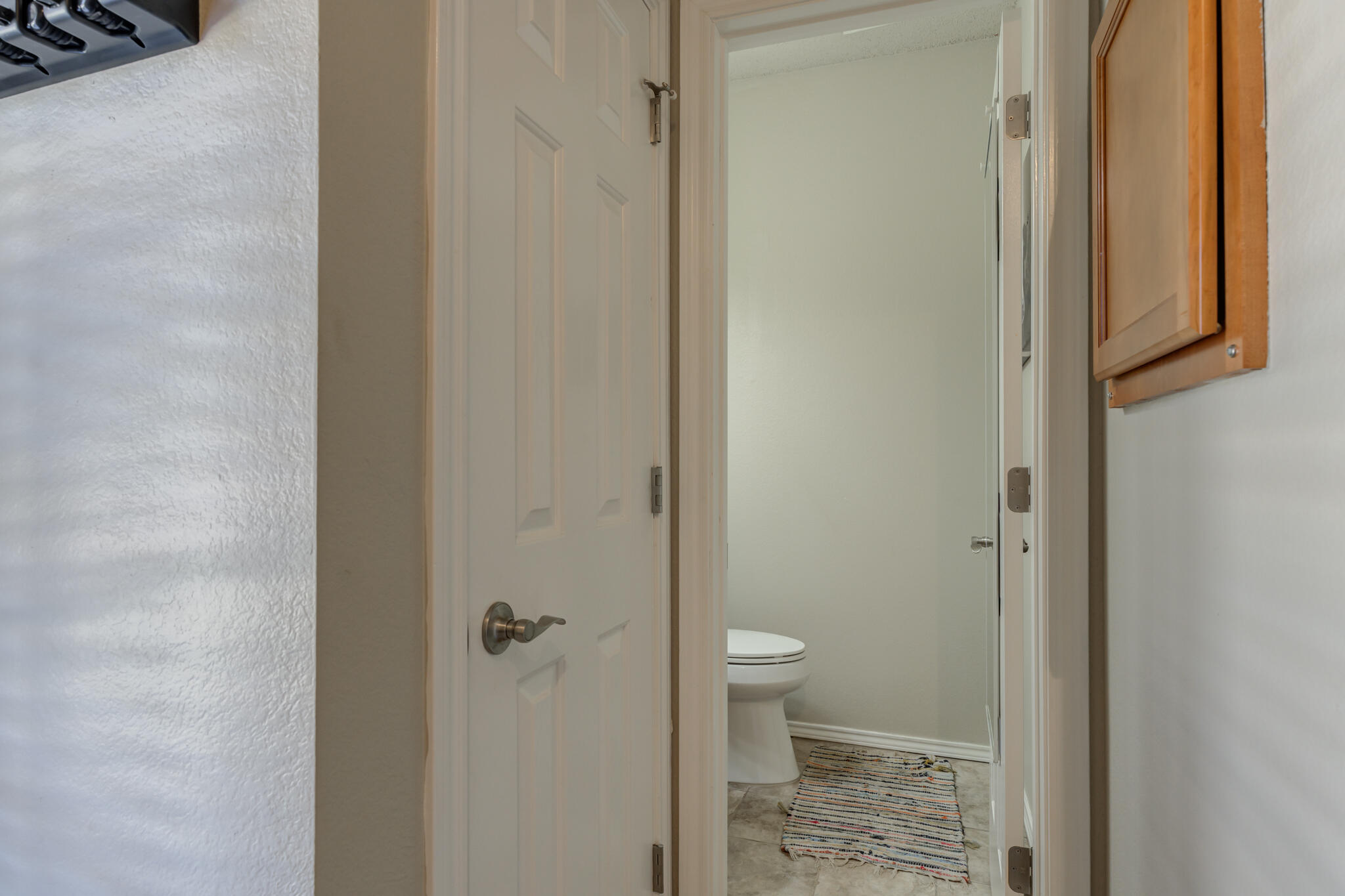 2108 Main Street, Unit 1 Lubbock, TX 79401 - Photo 16 of 29 a bathroom with a granite countertop shower