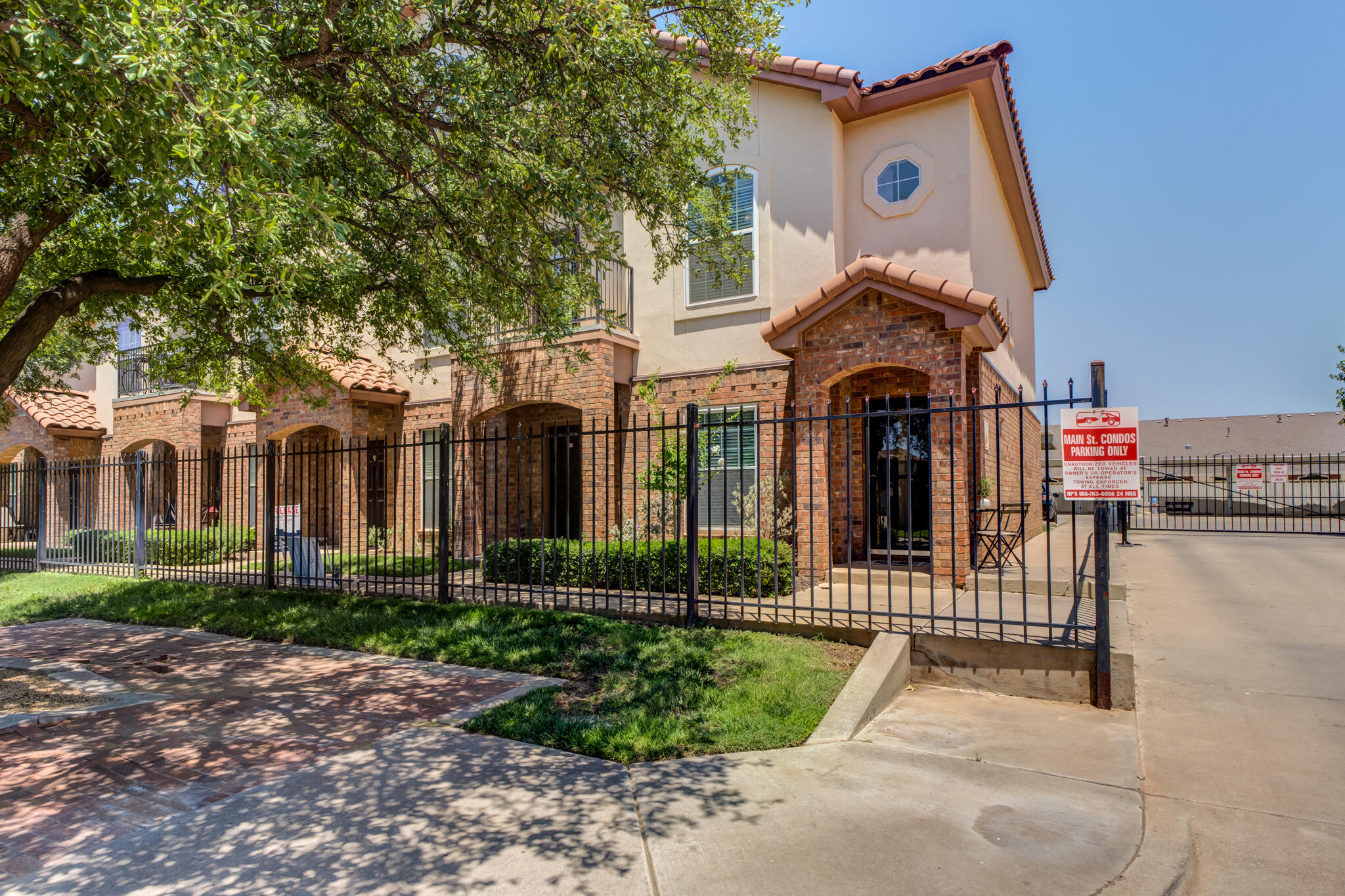 2108 Main Street, Unit 1 Lubbock, TX 79401 - Photo 2 of 29 a front view of a house with a porch