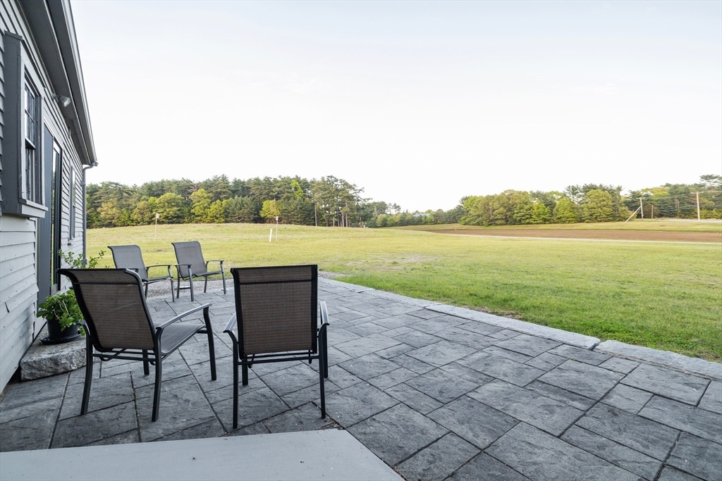 79 Wapping Road Kingston, MA 02364 - Photo 13 of 19 a view of a lake with furniture and city view