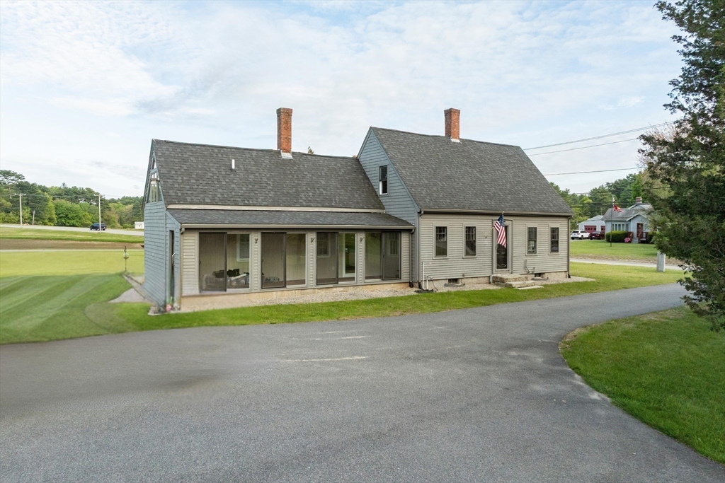 79 Wapping Road Kingston, MA 02364 - Photo 14 of 19 a front view of a house with a yard and porch