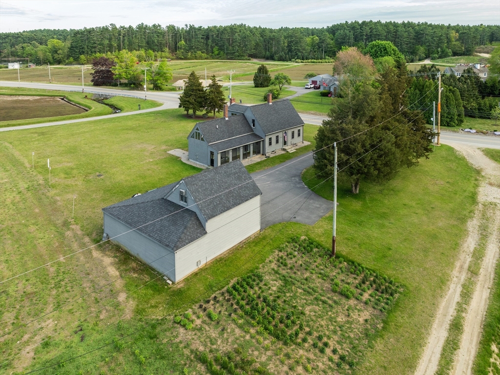 79 Wapping Road Kingston, MA 02364 - Photo 16 of 19 a view of a garden with lawn chairs