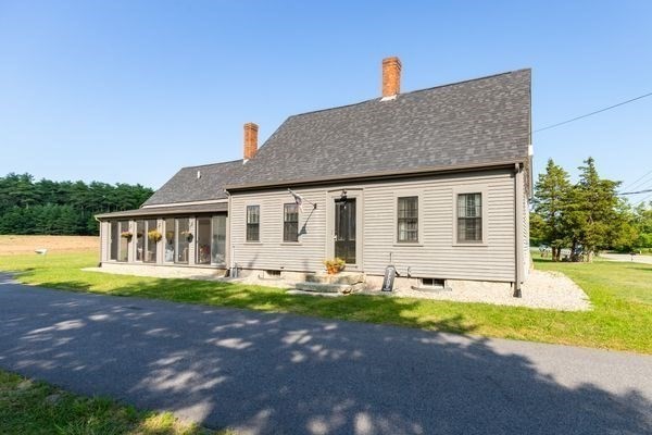 79 Wapping Road Kingston, MA 02364 - Photo 3 of 19 a front view of a house with garden and porch