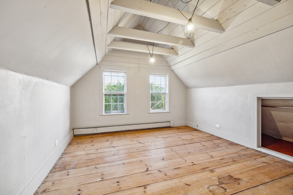 79 Wapping Road Kingston, MA 02364 - Photo 9 of 19 a view of empty room with wooden floor and fan