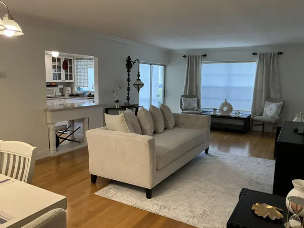 a living room with furniture and a table