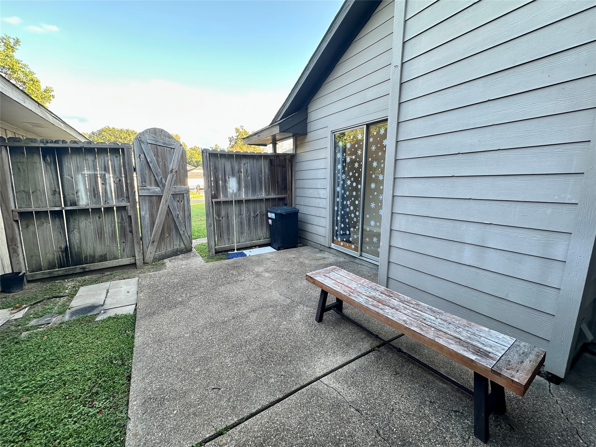 3126 Forestbrook Drive Spring, TX 77373 - Photo 16 of 18 a backyard of a house with barbeque oven and wooden fence