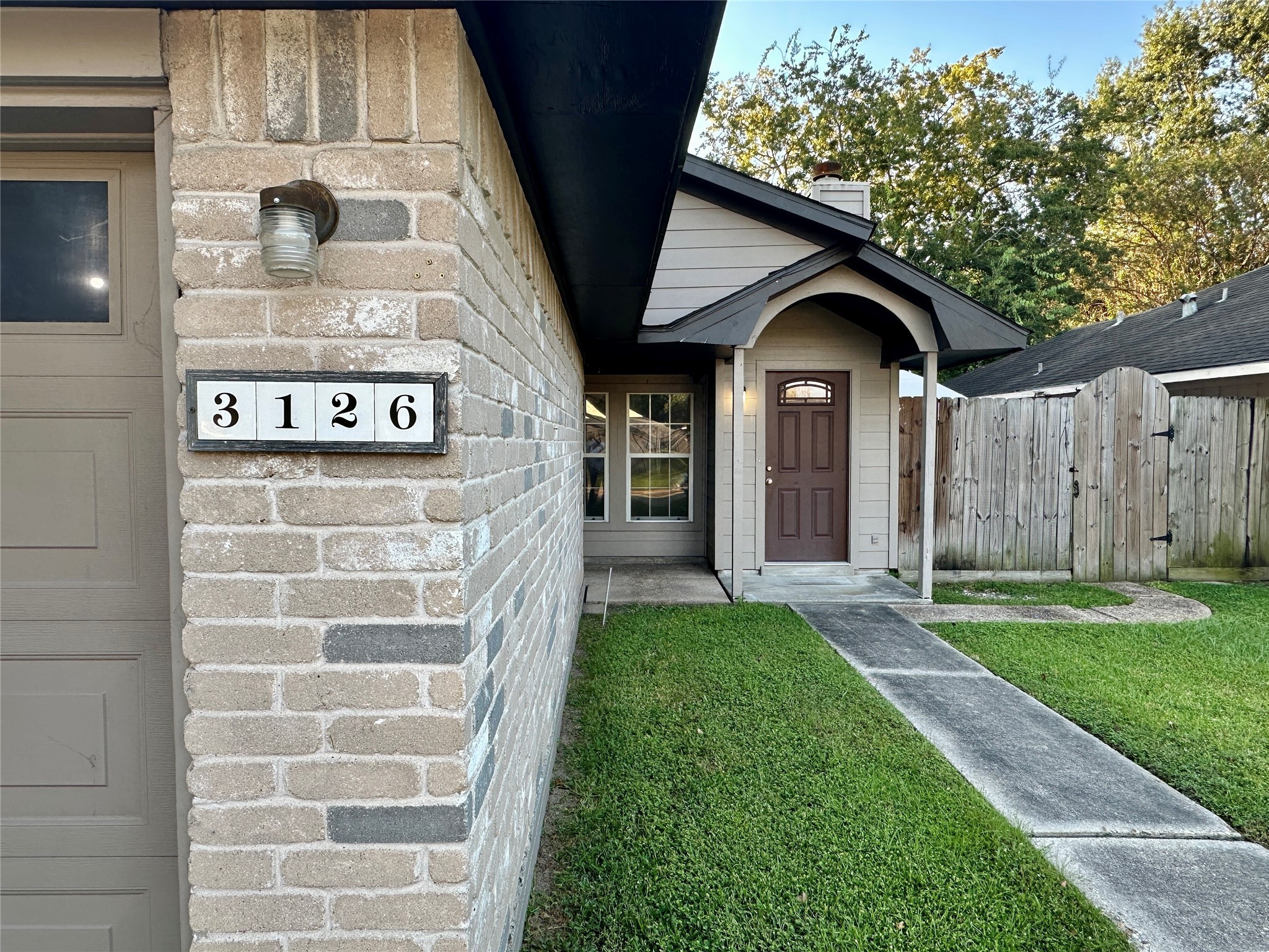 3126 Forestbrook Drive Spring, TX 77373 - Photo 2 of 18 a front view of a house with garden
