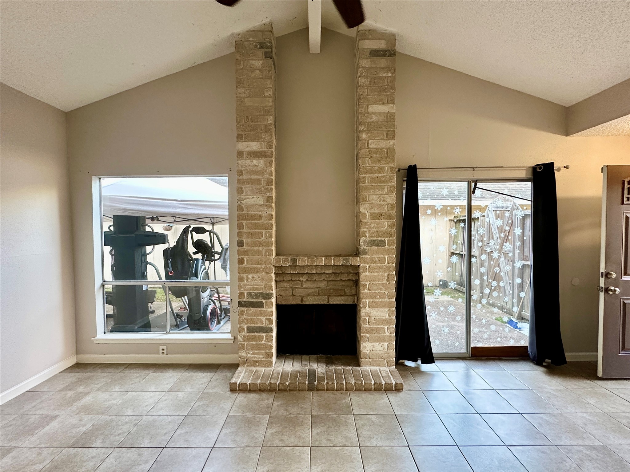 3126 Forestbrook Drive Spring, TX 77373 - Photo 5 of 18 a view of a hallway with two windows and a fireplace