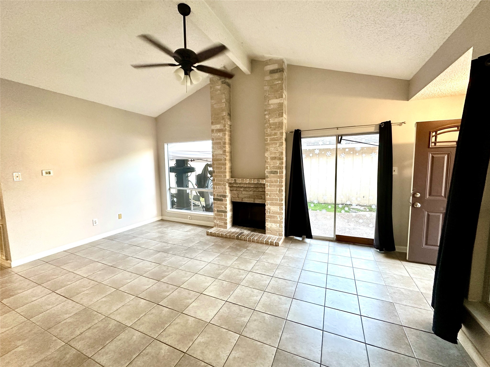 3126 Forestbrook Drive Spring, TX 77373 - Photo 6 of 18 a view of a livingroom with a fireplace and a chandelier