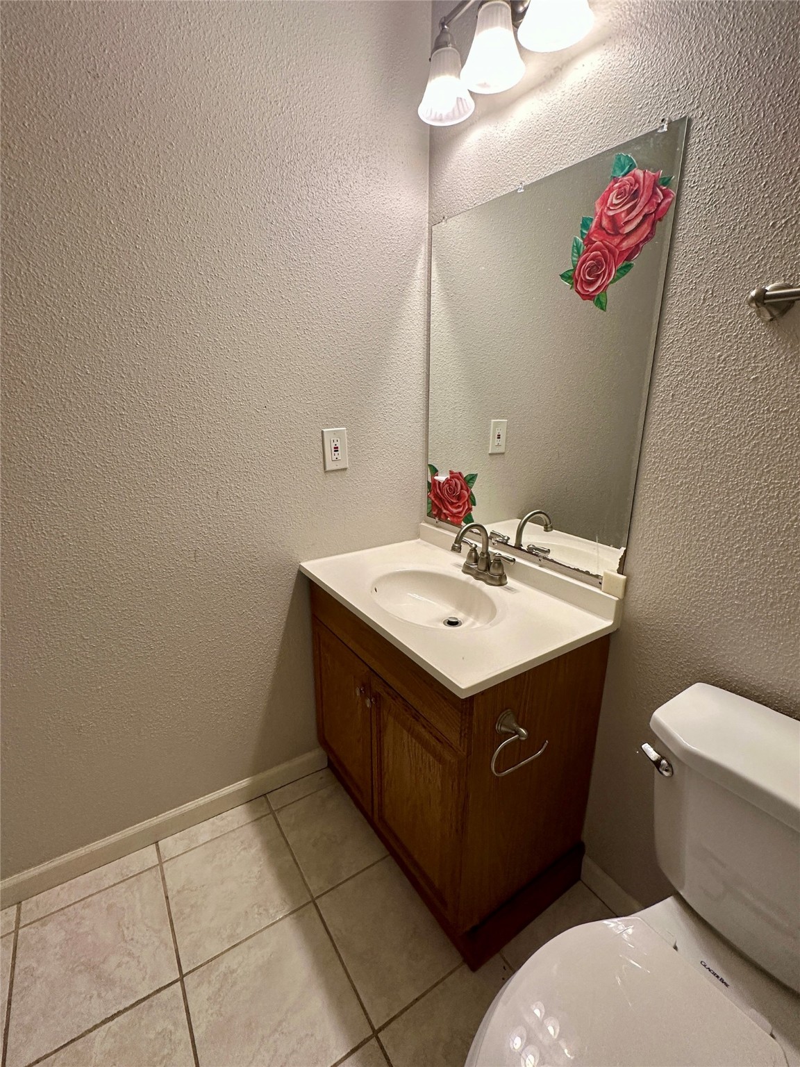 3126 Forestbrook Drive Spring, TX 77373 - Photo 8 of 18 a bathroom with a sink vanity and a mirror
