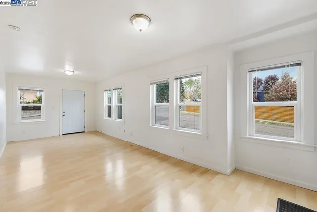 an empty room with windows