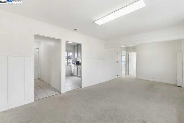 a view of a room with a large window