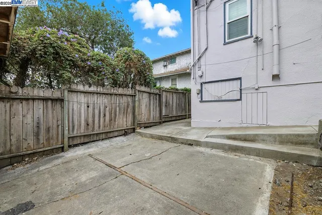 a view of a backyard of the house