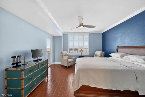 a bedroom with bed and window