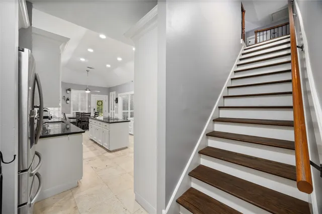 a living room with furniture a window and a table