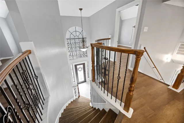 a living room with furniture ceiling fan and a rug