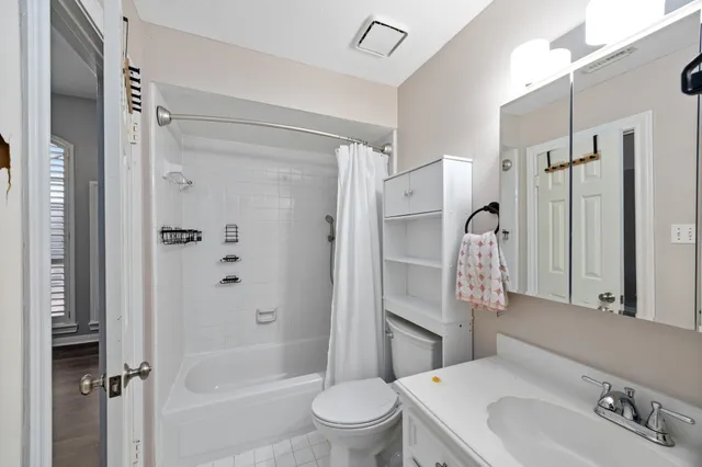 a view of a house with swimming pool and a porch