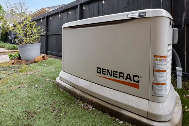 a view of a patio with chairs and a backyard