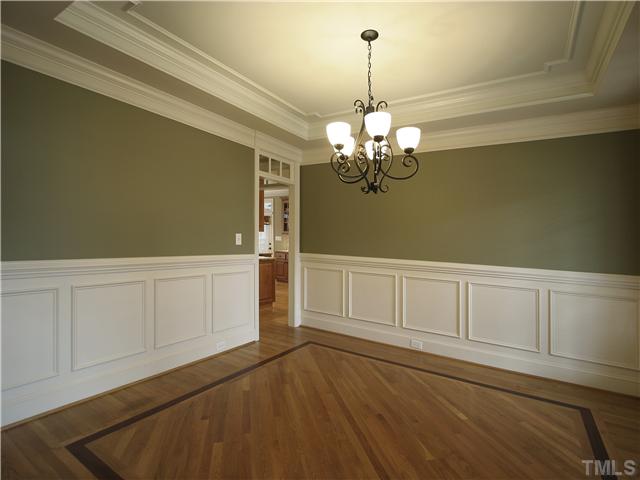 1200 Verde Farm Road Raleigh, NC 27603 - Photo 13 of 25 Entertain in style in this lovely formal dining room. Elegant trey ceiling with crown molding. Raised-panel wainscot. Inlaid wood floor. Oil-rubbed-bronze light fixture.