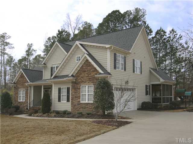 1200 Verde Farm Road Raleigh, NC 27603 - Photo 2 of 25 Side-load two-car garage. Plenty of driveway parking as well. Stacked stone and fiber cement siding. Home has been lovingly cared for and is in pristine condition.