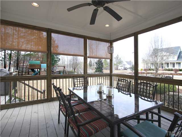 1200 Verde Farm Road Raleigh, NC 27603 - Photo 20 of 25 Screened porch affords a nice view of the back yard.