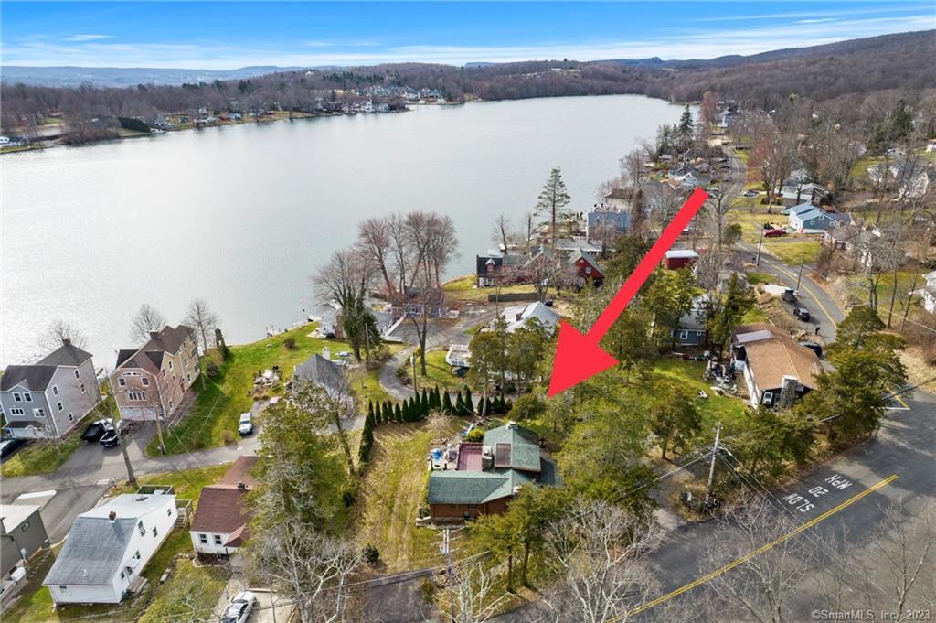 67 Lake Road Middlefield, CT 06455 - Photo 1 of 1 a view of a lake with a mountain