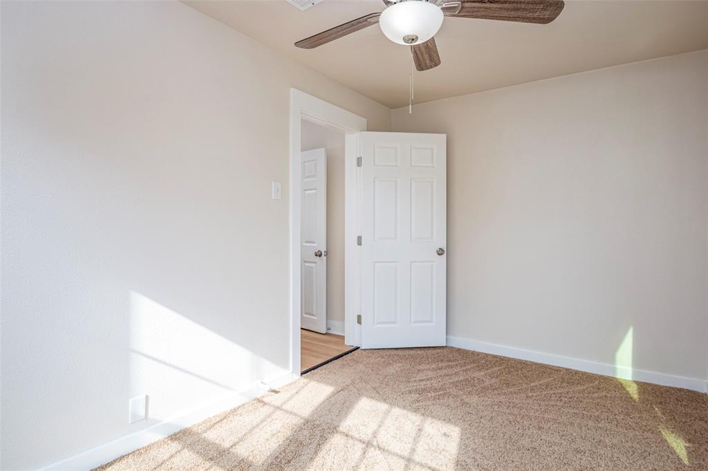 628 South Westmoreland Road Dallas, TX 75211 - Photo 11 of 19 a view of a livingroom with a ceiling fan