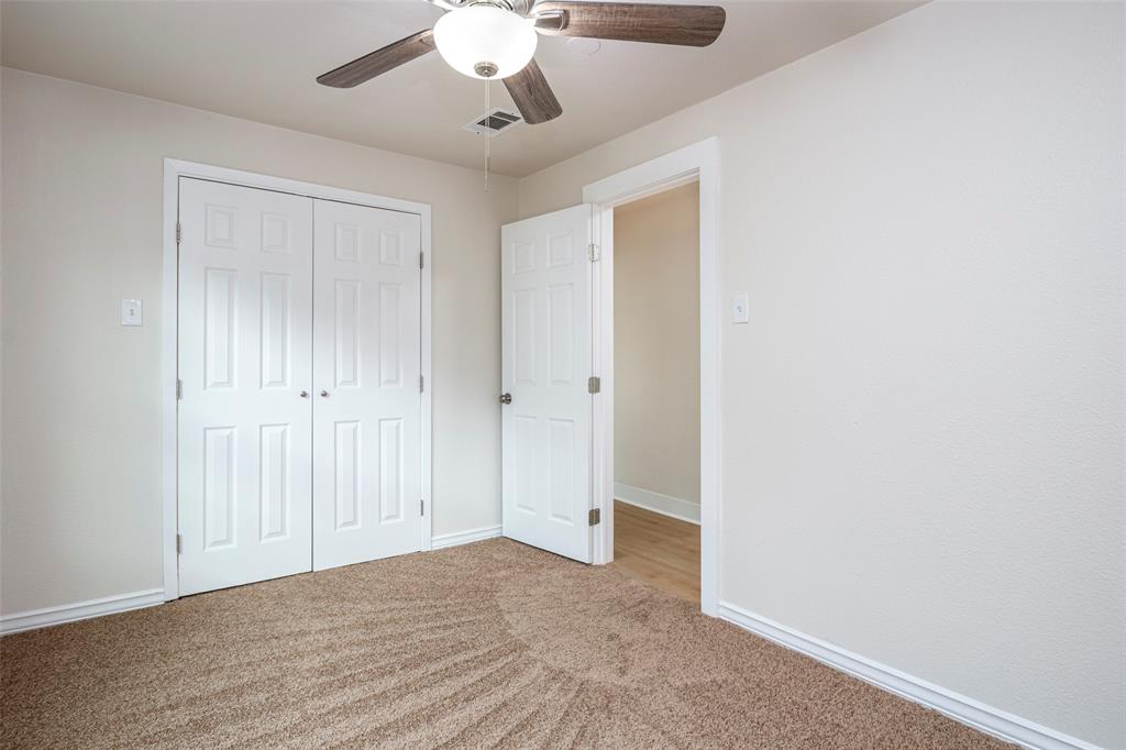 628 South Westmoreland Road Dallas, TX 75211 - Photo 13 of 19 wooden floor in an empty room