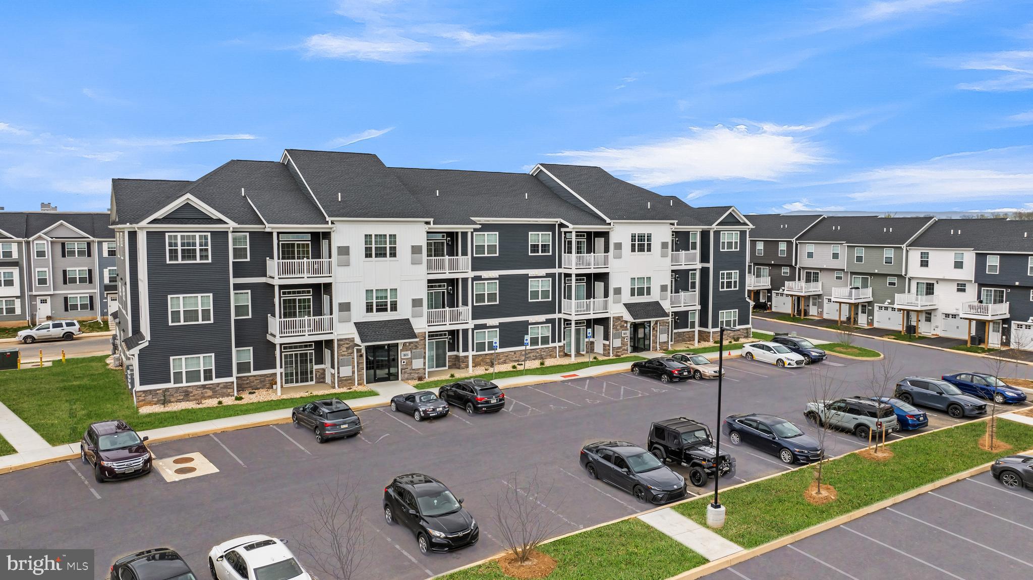 1201 Walnut Bottom Road, Unit 81201 Carlisle, PA 17015 - Photo 1 of 33 a front view of a building with parking area