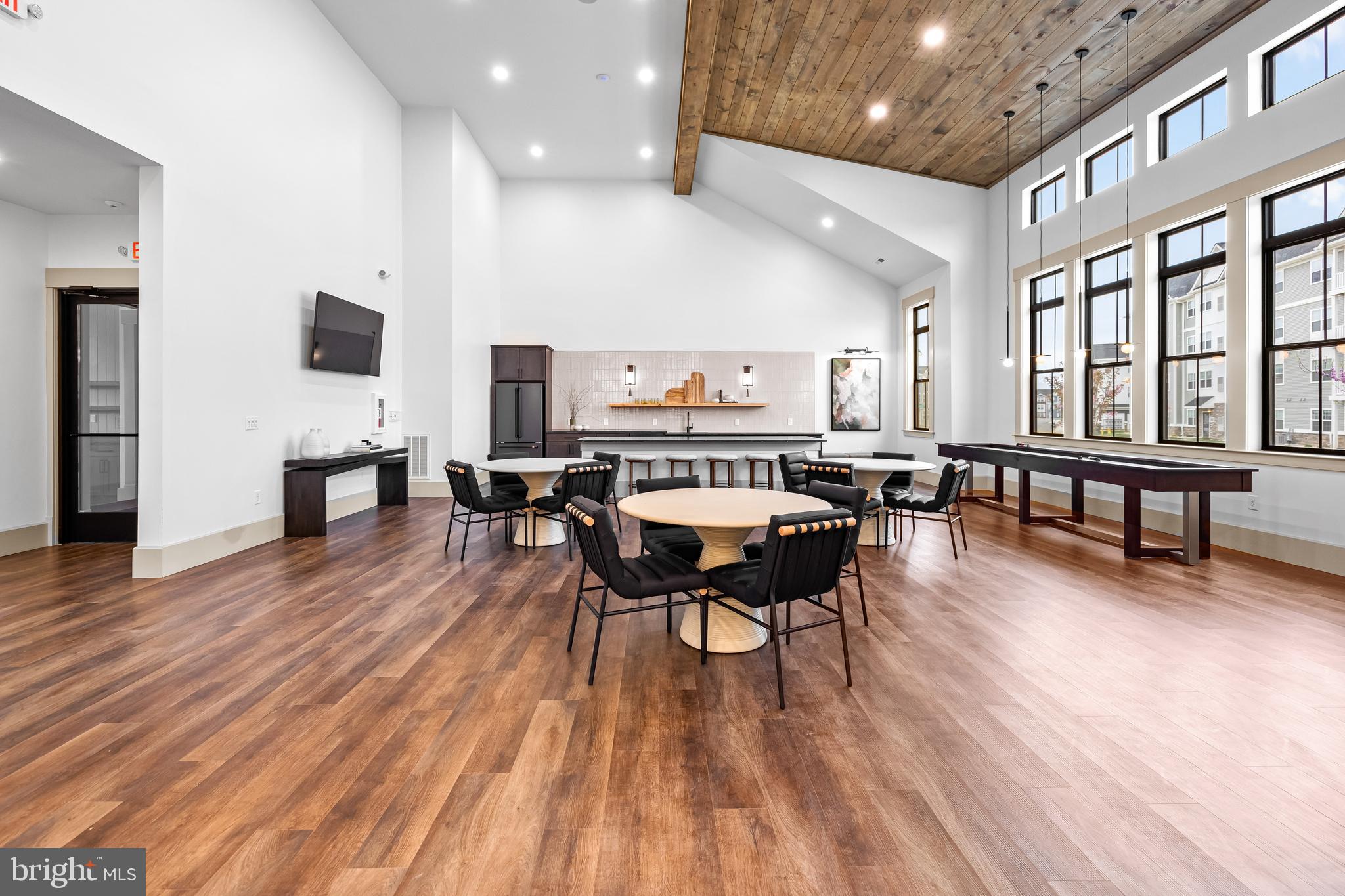 1201 Walnut Bottom Road, Unit 81201 Carlisle, PA 17015 - Photo 23 of 33 a living room with furniture and a wooden floor