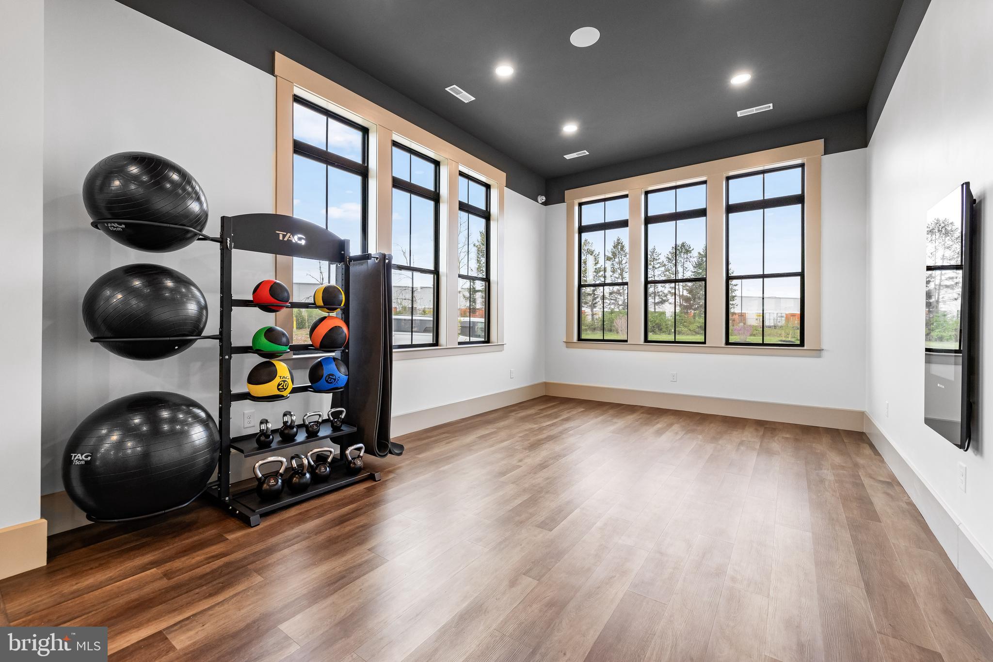 1201 Walnut Bottom Road, Unit 81201 Carlisle, PA 17015 - Photo 30 of 33 a view of a room with wooden floor and windows