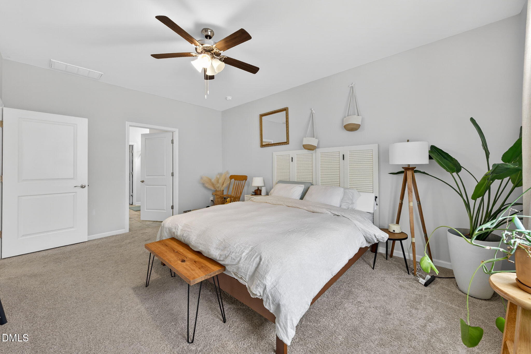 1519 Nichols Crk Road Durham, NC 27703 - Photo 15 of 22 a spacious bedroom with a bed and ceiling fan