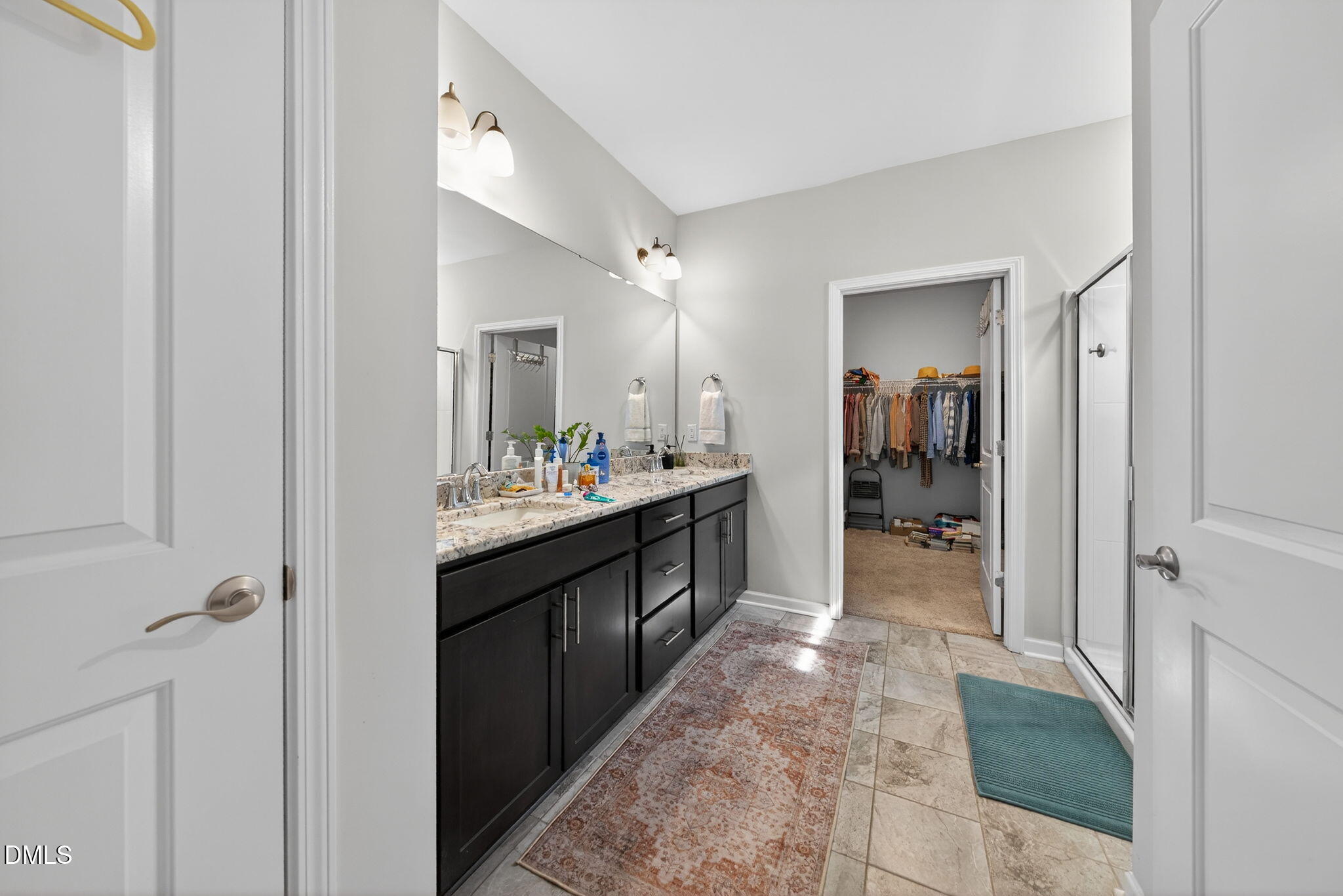 1519 Nichols Crk Road Durham, NC 27703 - Photo 16 of 22 a large bathroom with a glass door shower and sink
