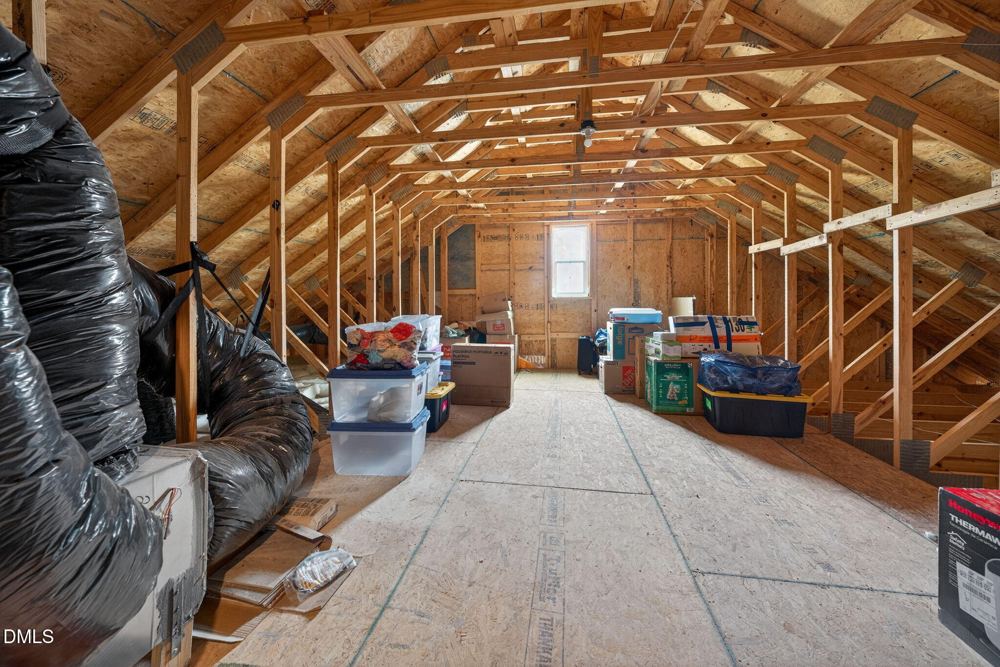 1519 Nichols Crk Road Durham, NC 27703 - Photo 17 of 22 a living room with furniture and a potted plant