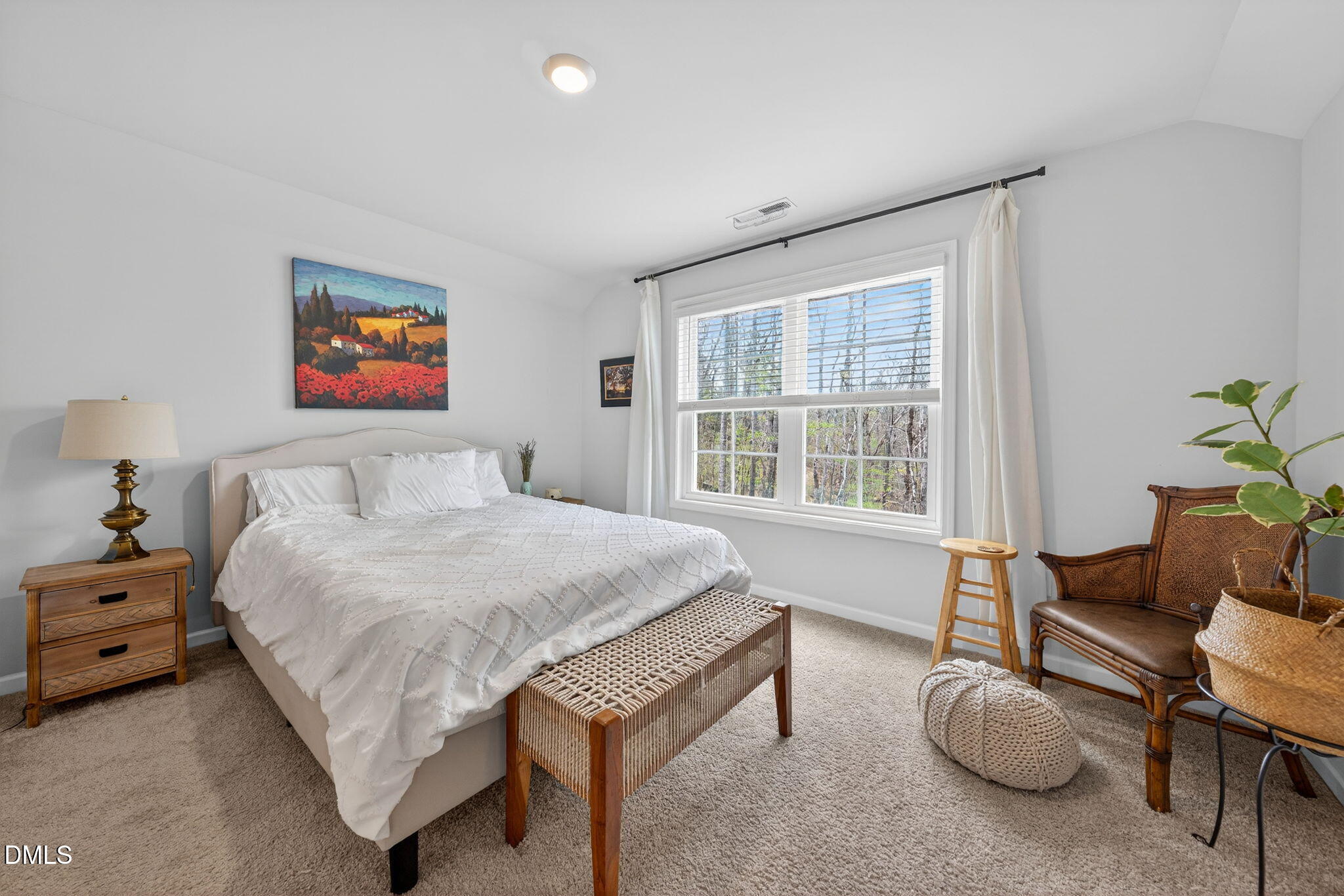1519 Nichols Crk Road Durham, NC 27703 - Photo 20 of 22 a spacious bedroom with a bed and a large window
