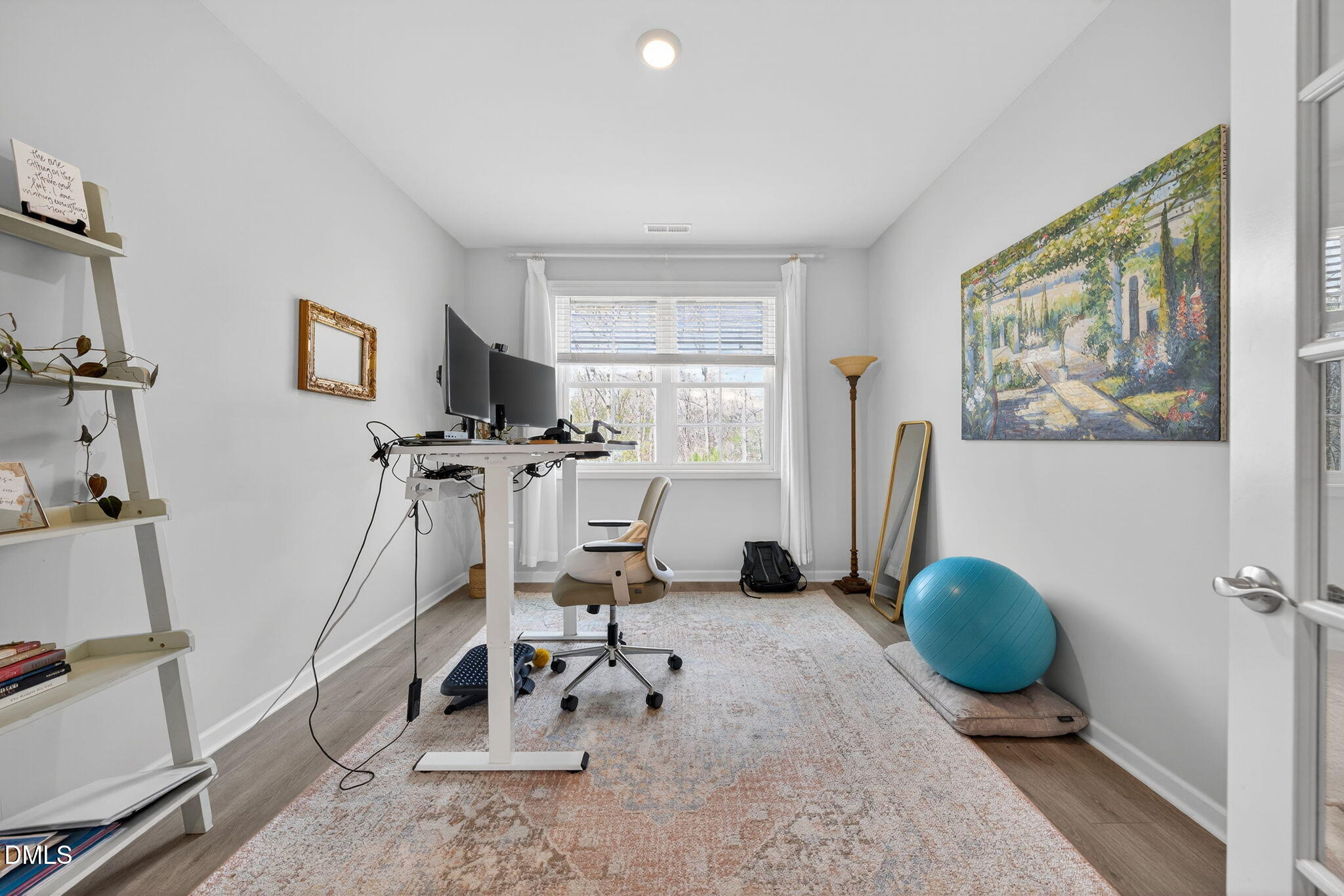 1519 Nichols Crk Road Durham, NC 27703 - Photo 6 of 22 a living room with furniture appliances and a flat screen tv